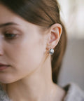 Sterling silver chunky barrel hoop earrings worn, side profile