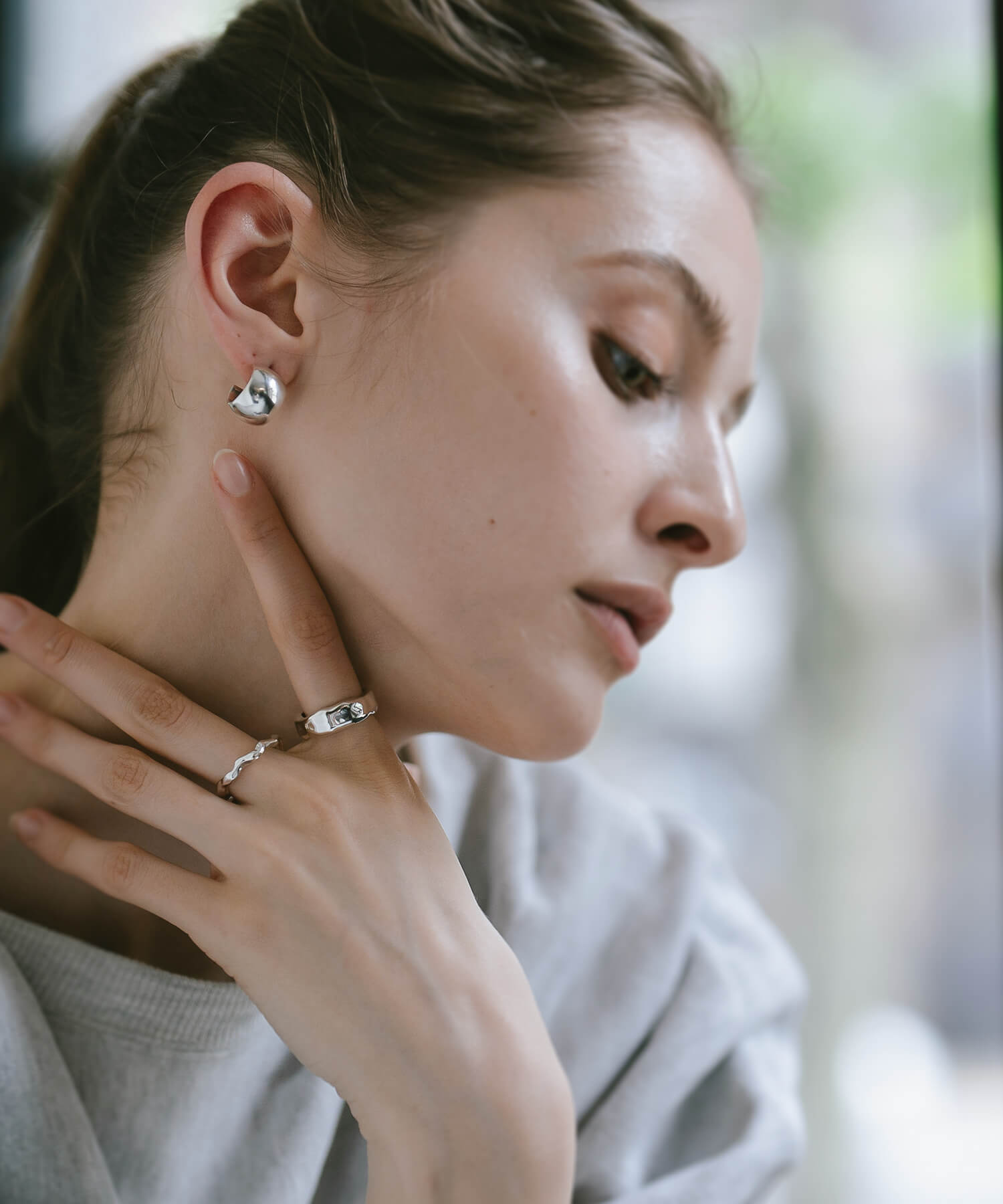 Silver 925 chunky hoop earrings on the ear