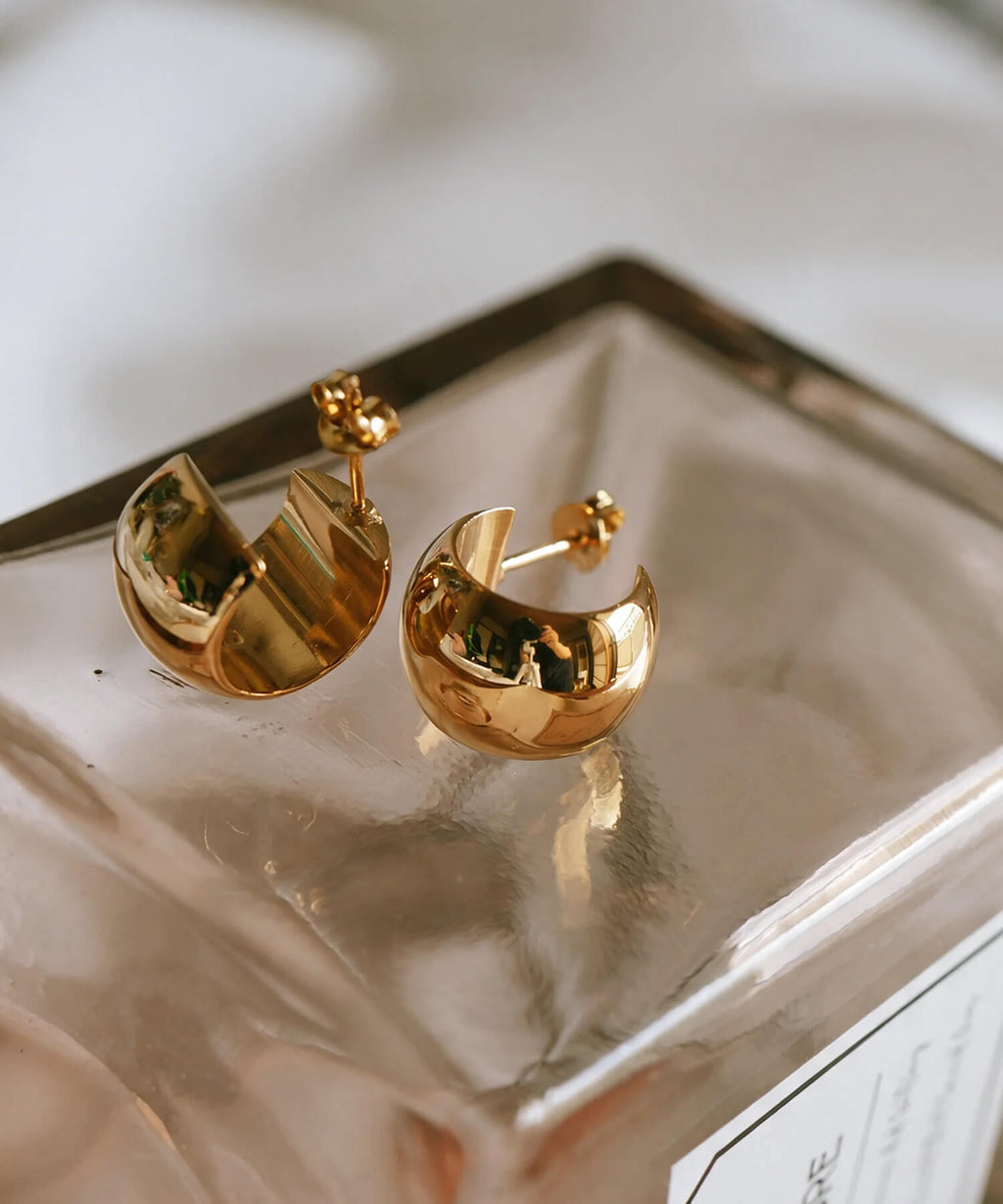 18K gold plated barrel hoop earrings, flat lay