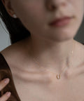 18K Gold & Platinum Diamond Horseshoe Necklace | COUPELLE