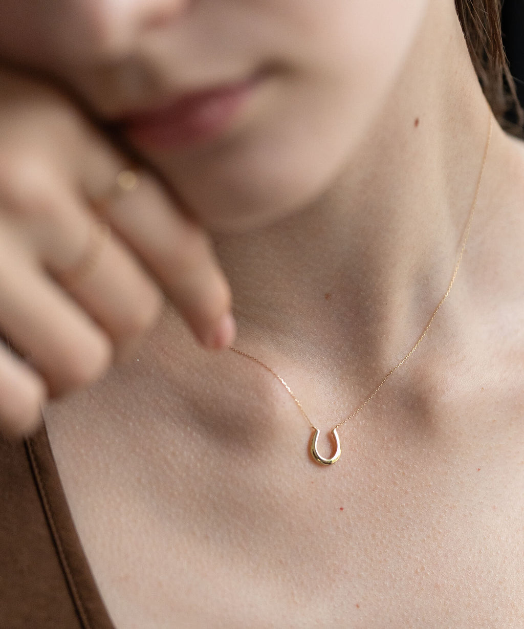 18K Gold & Platinum Diamond Horseshoe Necklace | COUPELLE