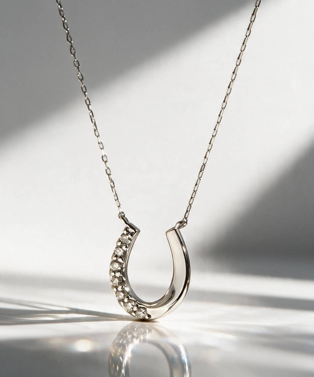 18K Gold & Platinum Diamond Horseshoe Necklace | COUPELLE