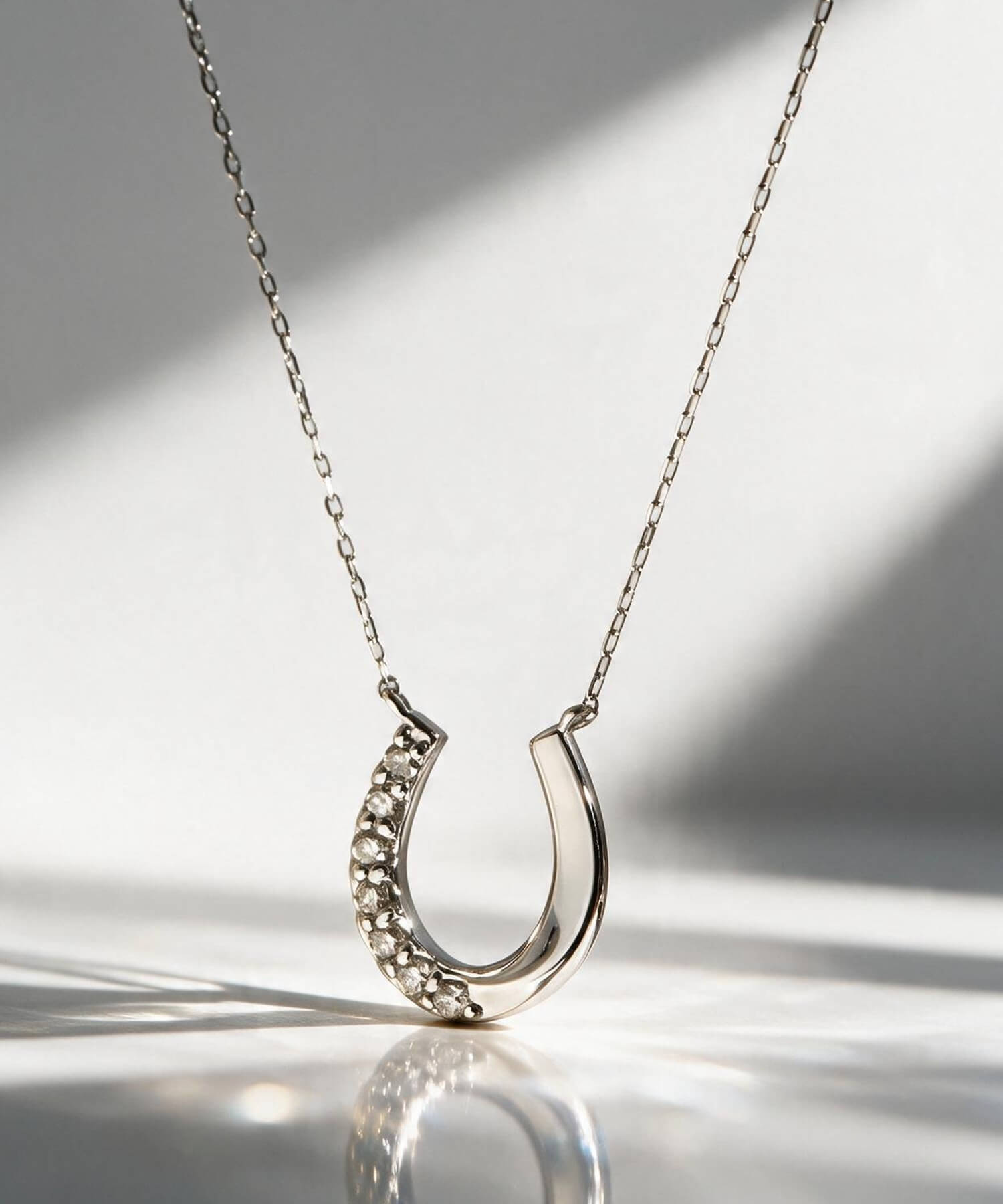 18K Gold & Platinum Diamond Horseshoe Necklace | COUPELLE