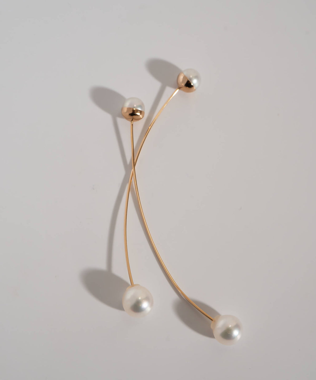 ILMARI earrings curved bar detail