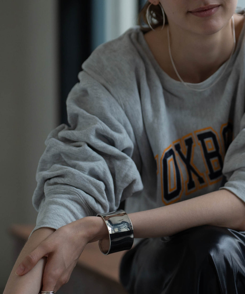 Wide straight cuff bangle as a statement wrist piece