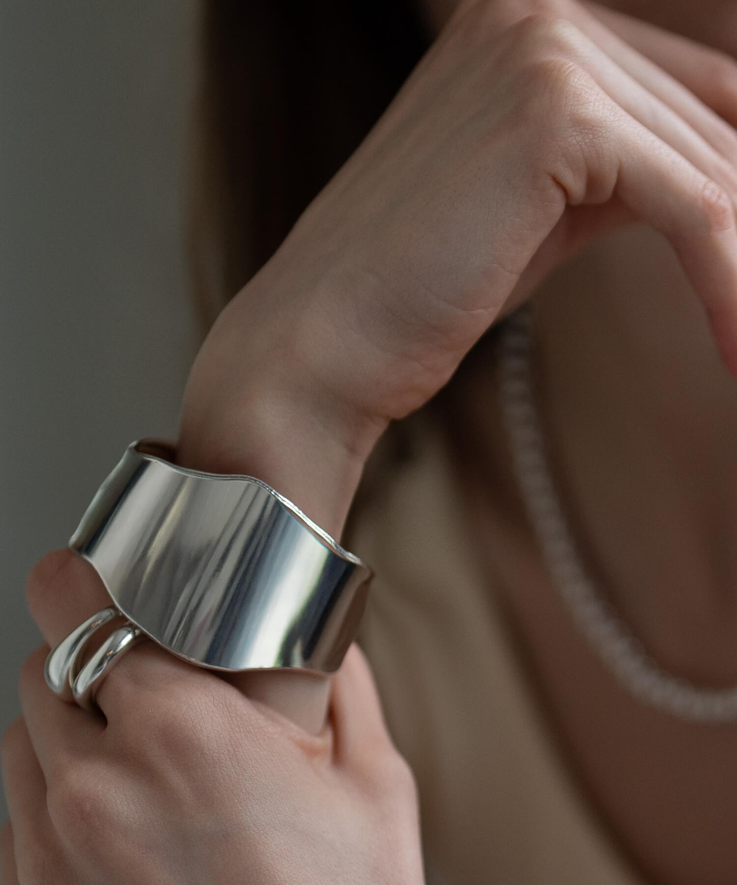 Organic wave silver cuff bangle as a wrist accent