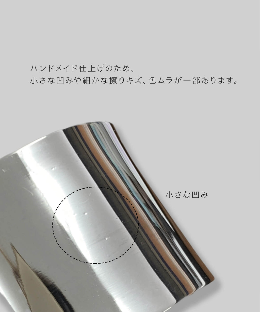 Side profile detail of the wide sterling silver cuff