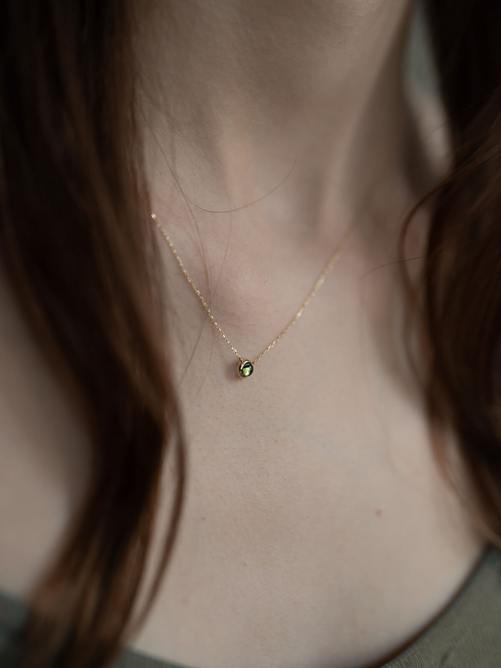 Peridot necklace on model