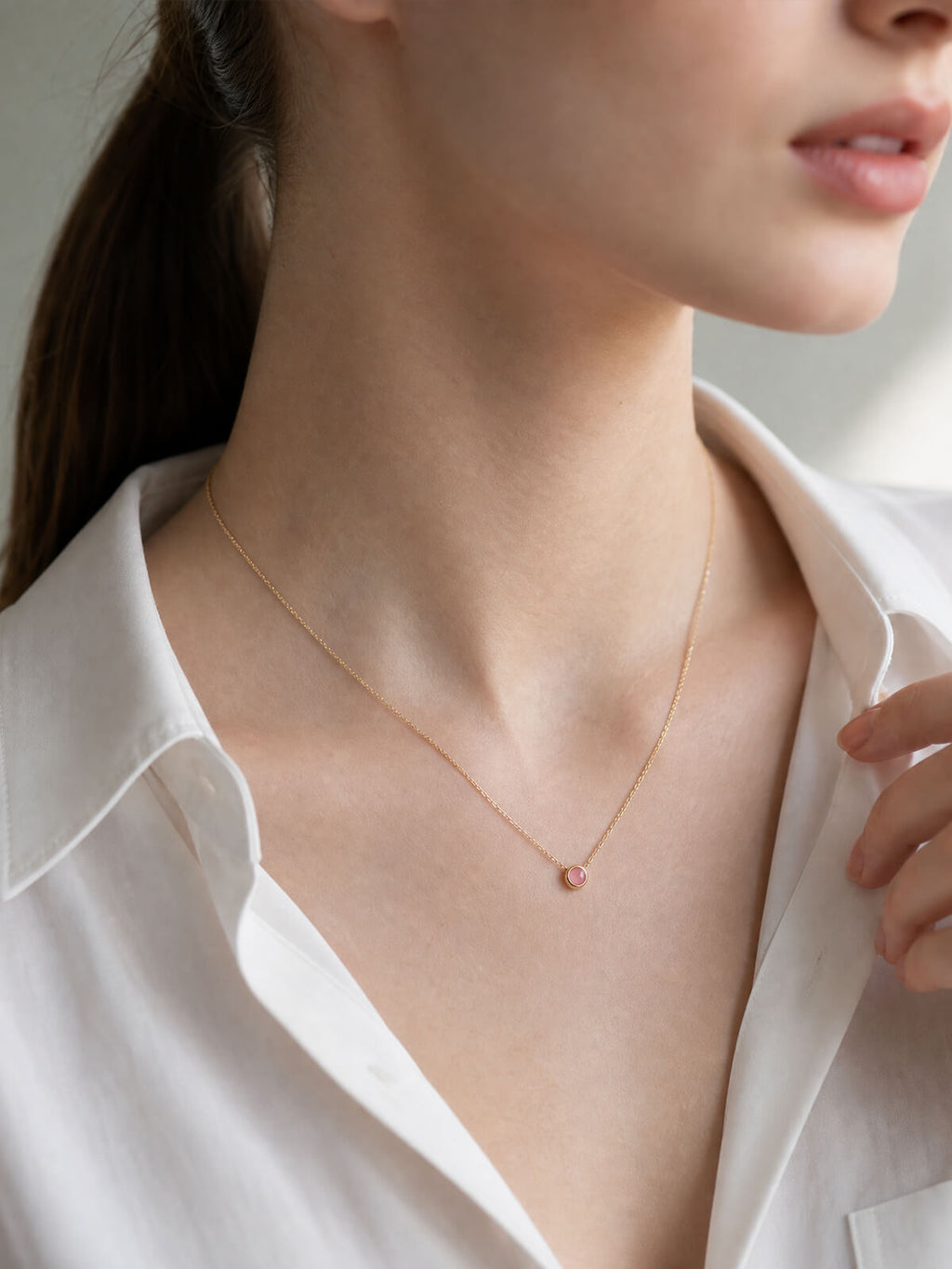Rhodochrosite necklace on model