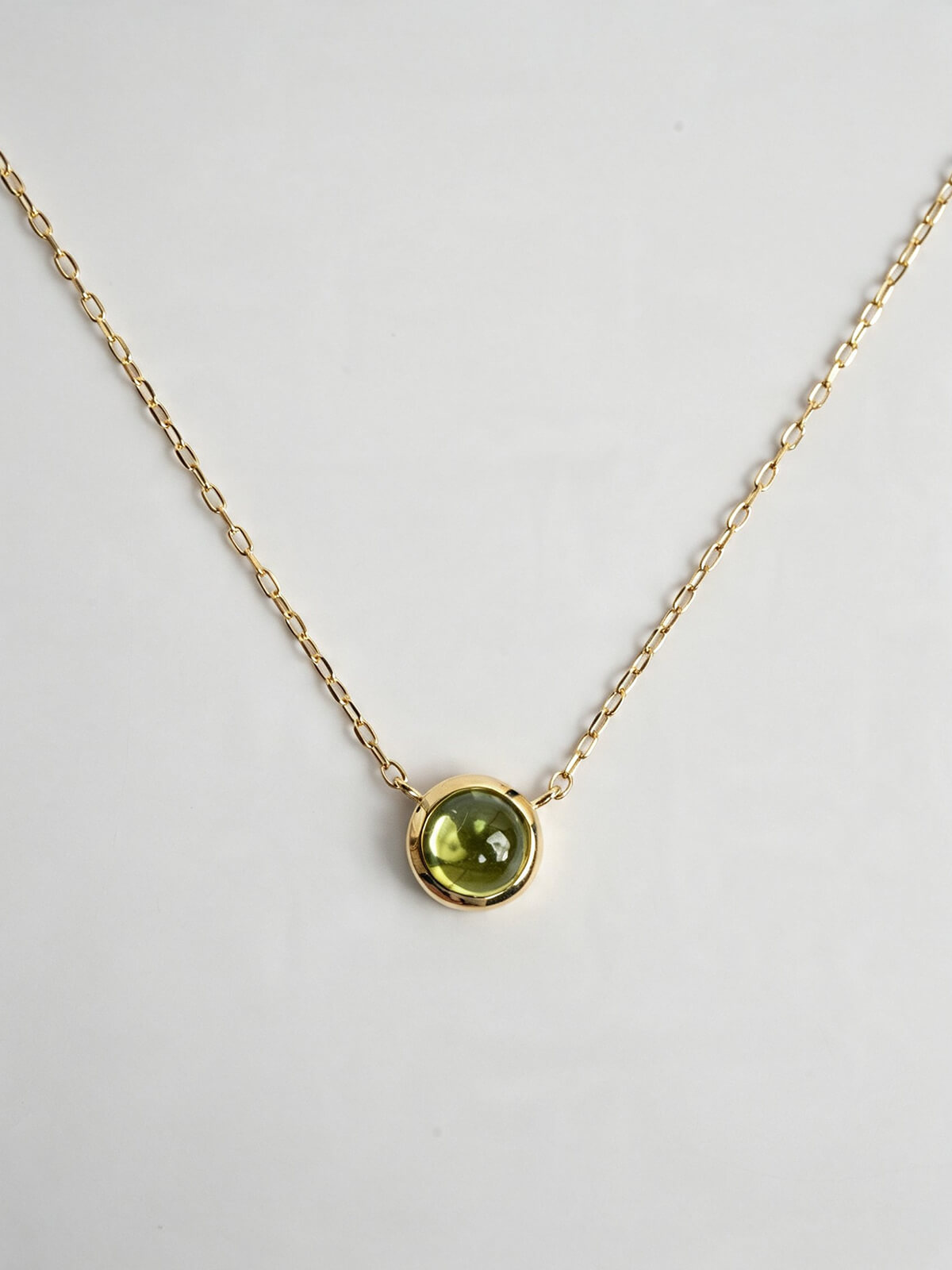 Peridot 10K gold cabochon necklace