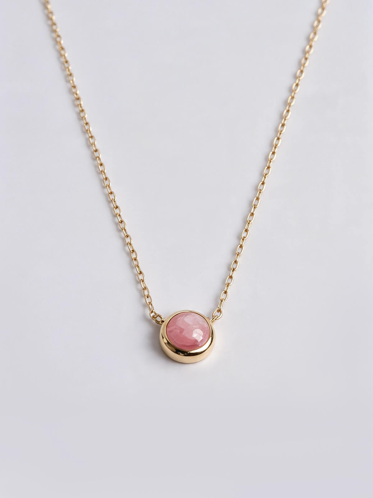 Rhodochrosite 10K gold cabochon necklace