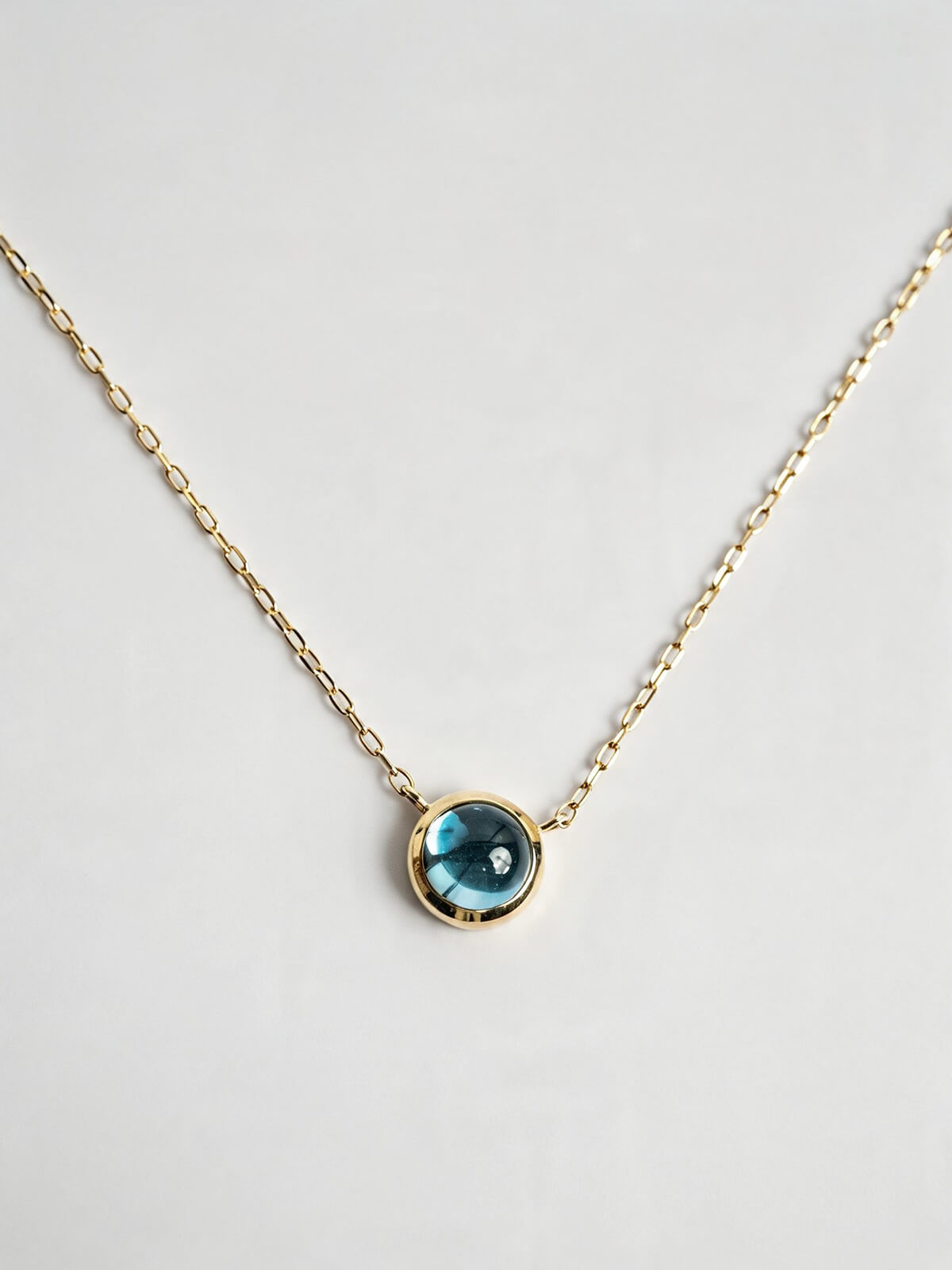 Swiss blue topaz 10K gold cabochon necklace