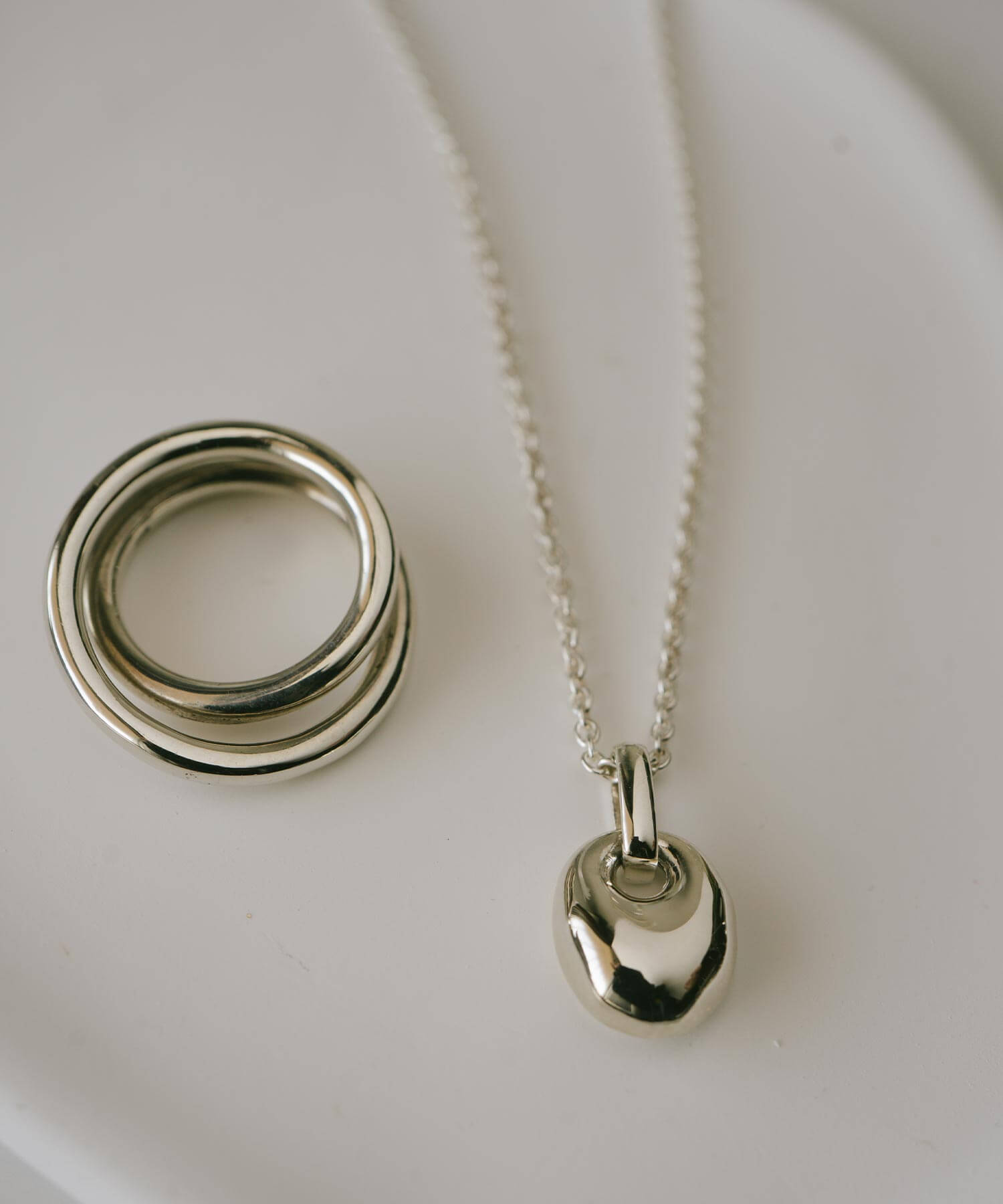 A Seed of Elegance Blooming in 18K Gold Plated Sterling Silver Necklace | MILIA