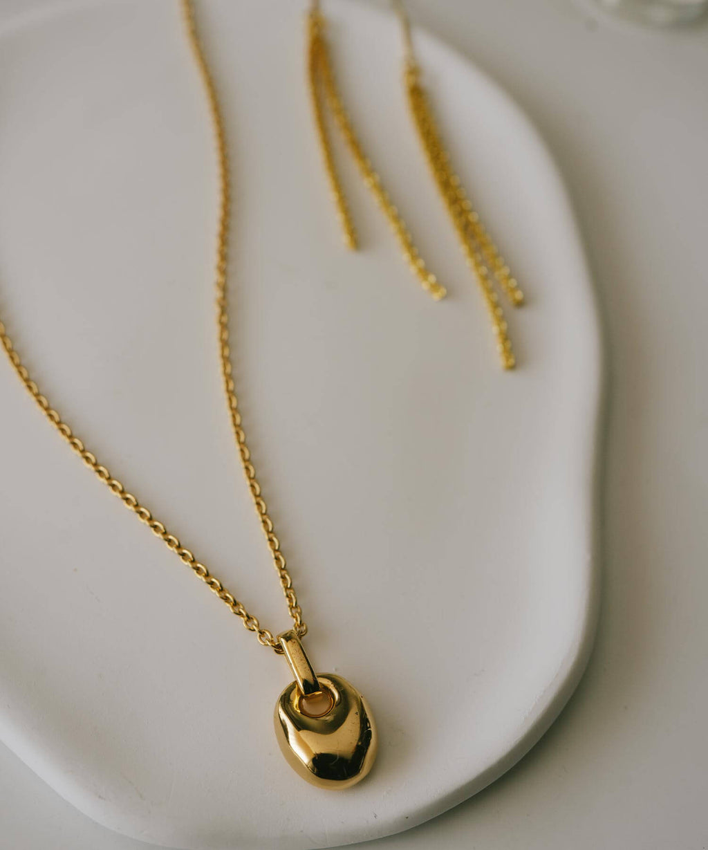 A Seed of Elegance Blooming in 18K Gold Plated Sterling Silver Necklace | MILIA