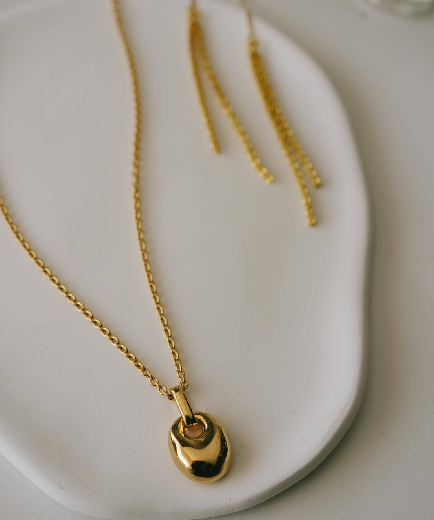 A Seed of Elegance Blooming in 18K Gold Plated Sterling Silver Necklace | MILIA