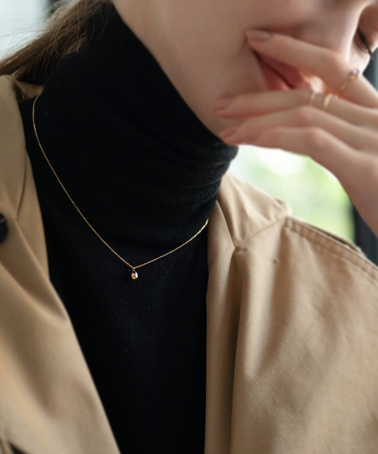 18K gold egg pendant on a fine chain