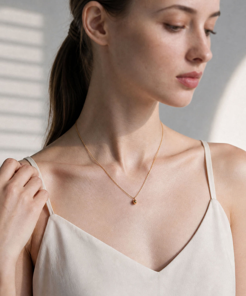 18K gold egg pendant necklace layered styling