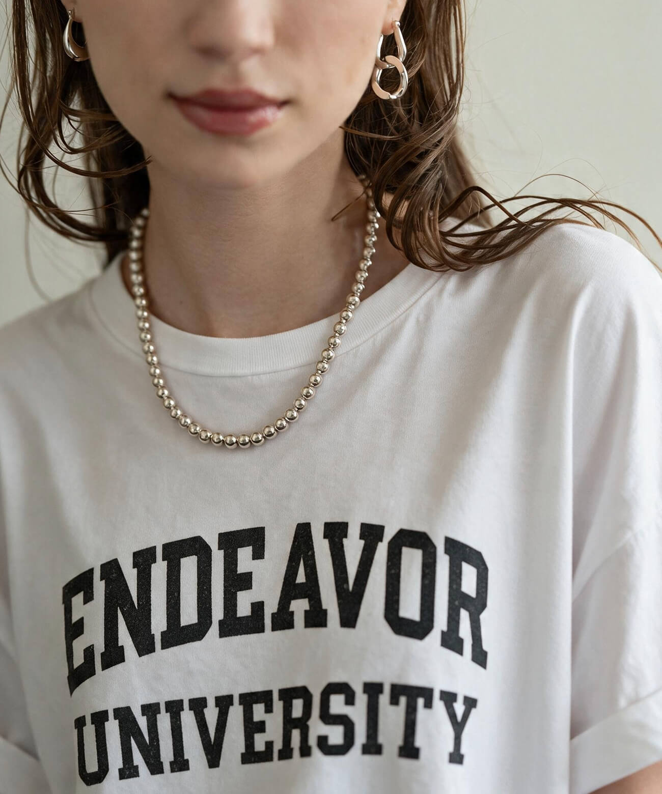 Sterling silver ball chain necklace with a white printed T-shirt