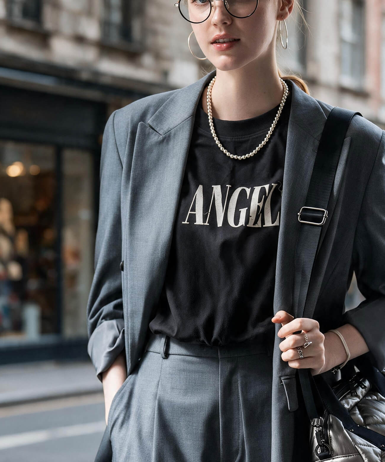 Sterling silver ball chain necklace styled with a tailored jacket