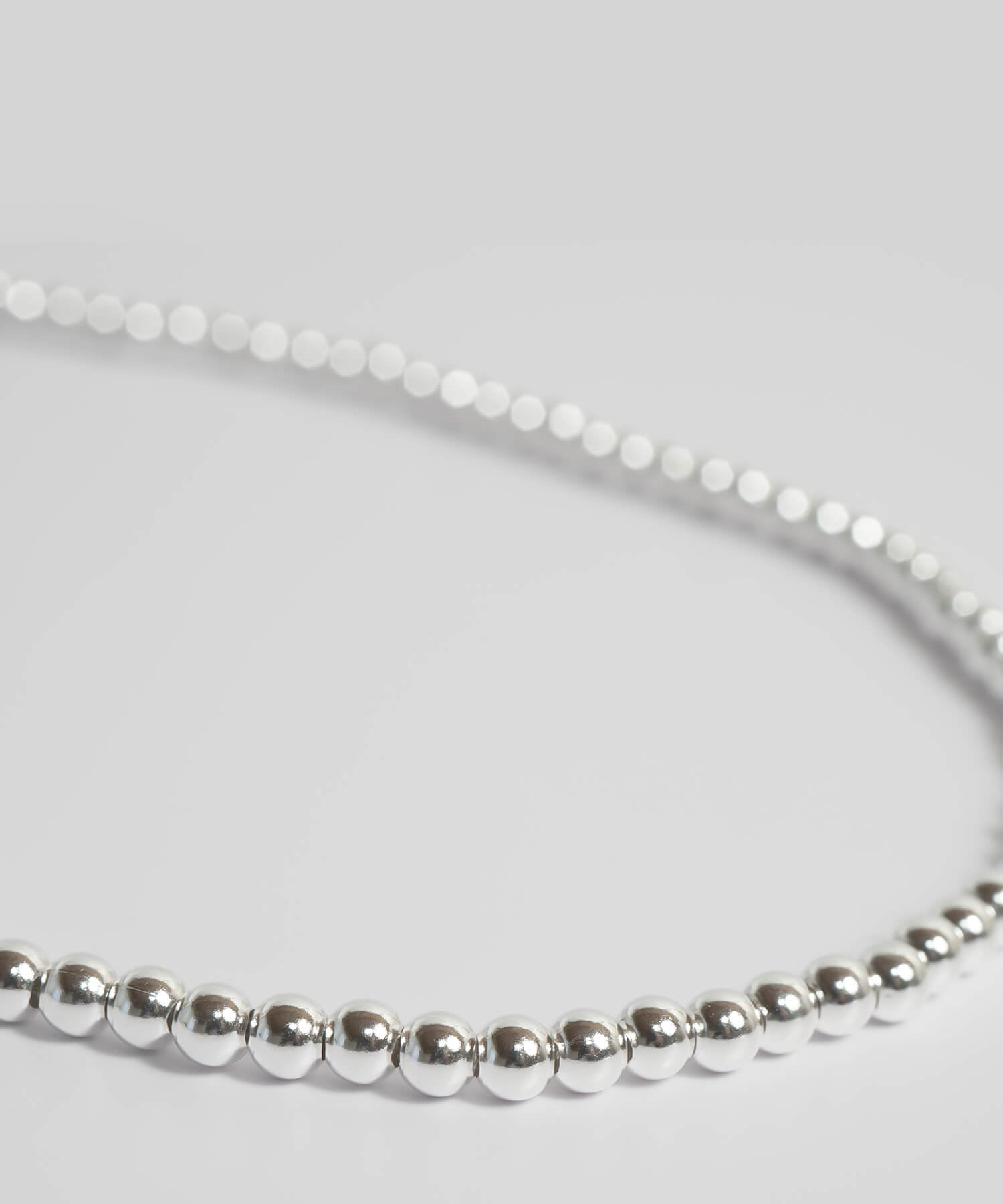 Close up of the polished sterling silver balls