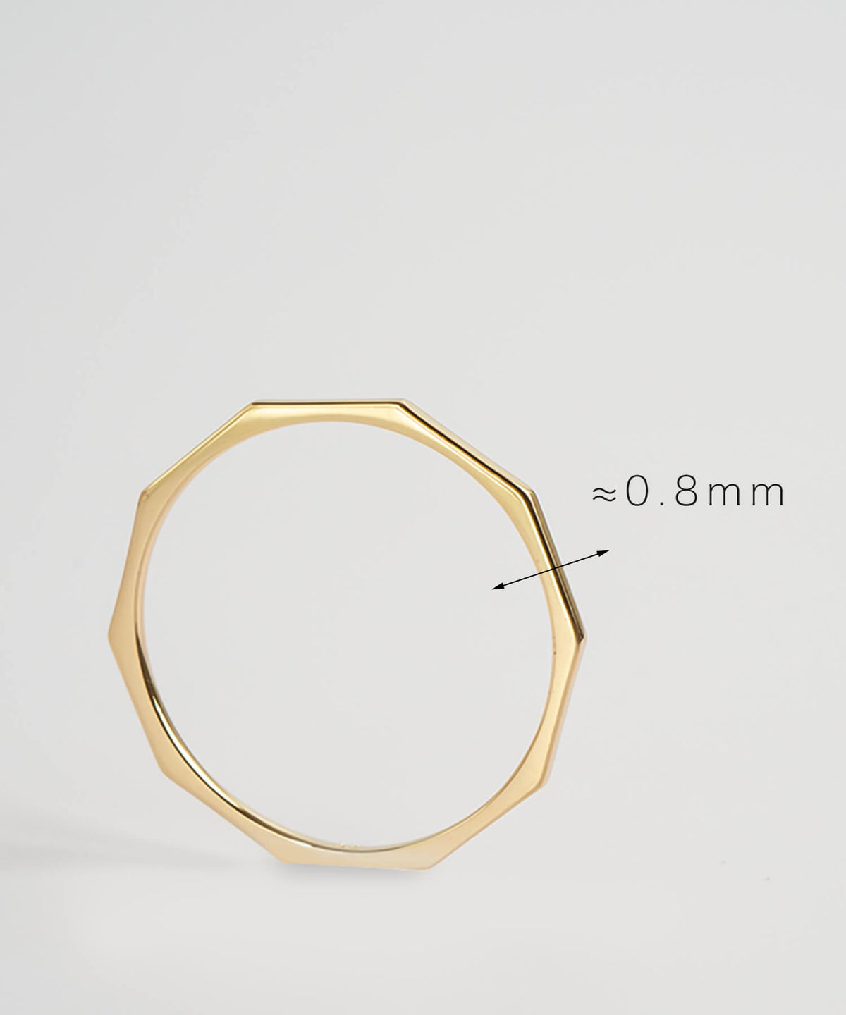 0.8mm band width of the 18K gold decagon skinny ring