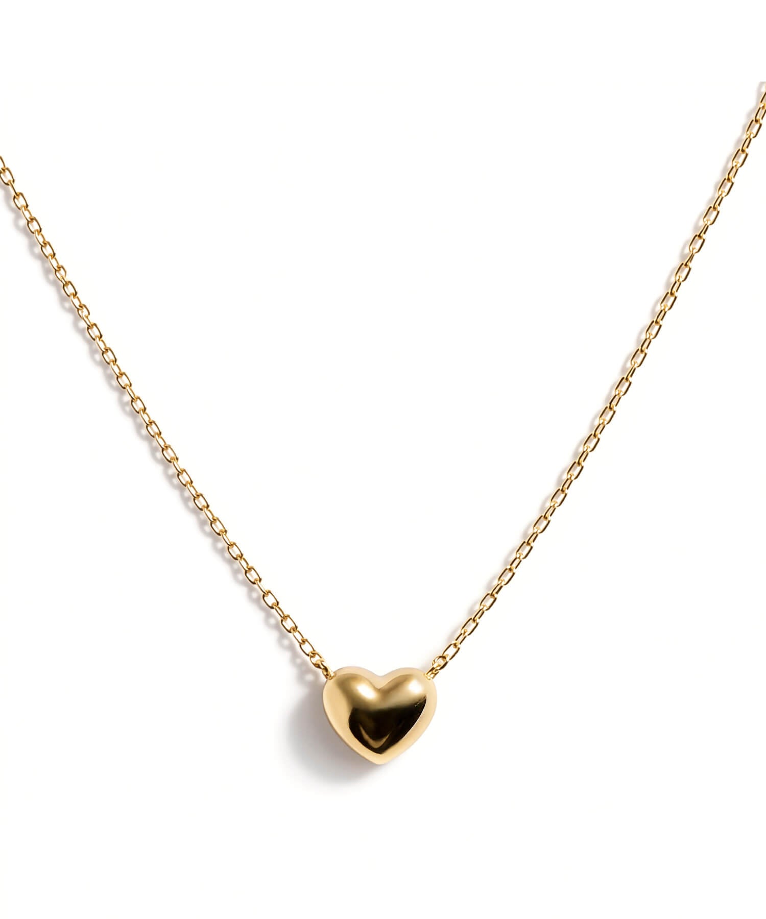 18K gold heart pendant necklace on a white background