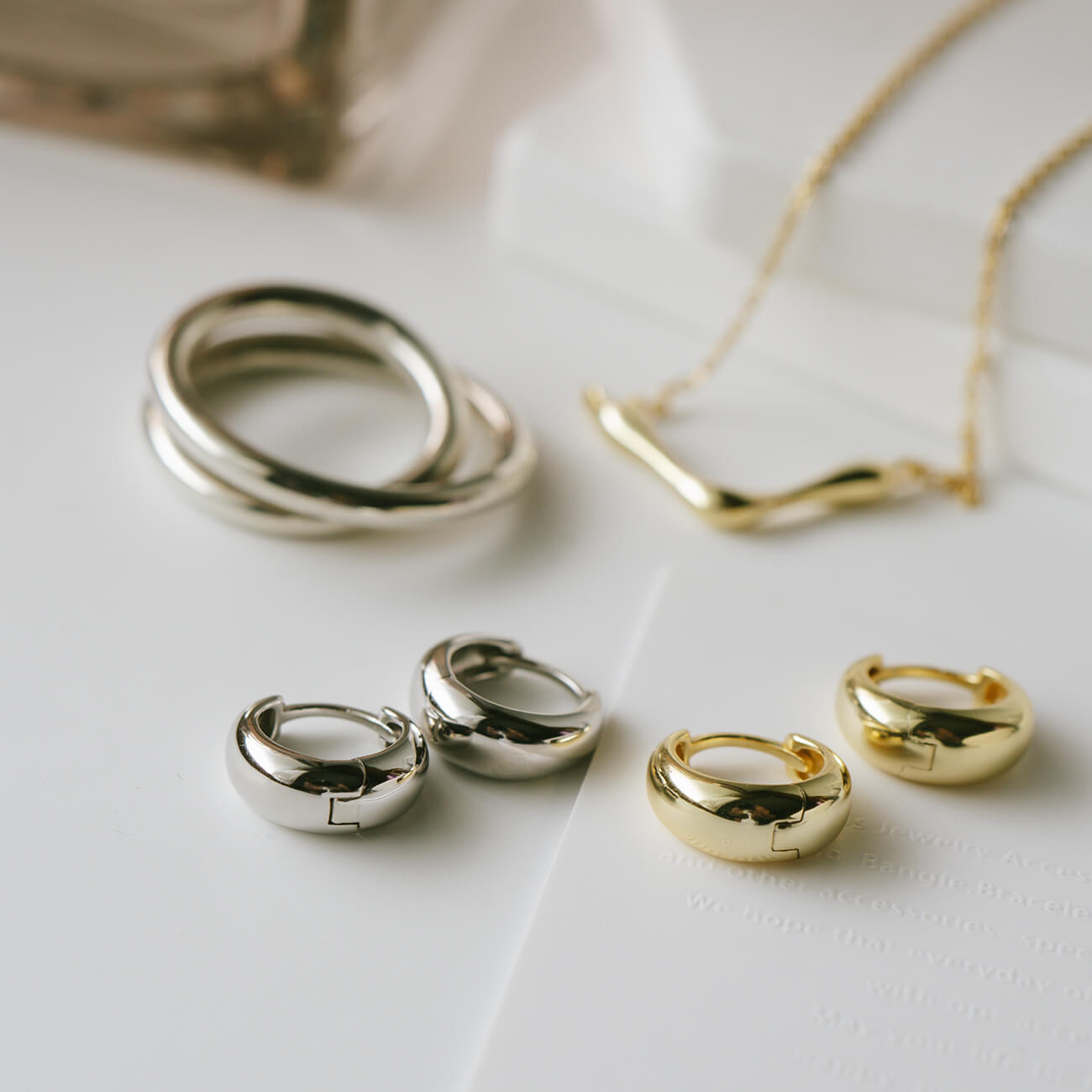 18K Gold Plated Sterling Silver Stout Tiny Hoop Earrings | KYKLOS-MOON